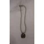 Silver stone set pendant on rope chain
