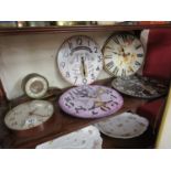 Shelf of novelty clocks