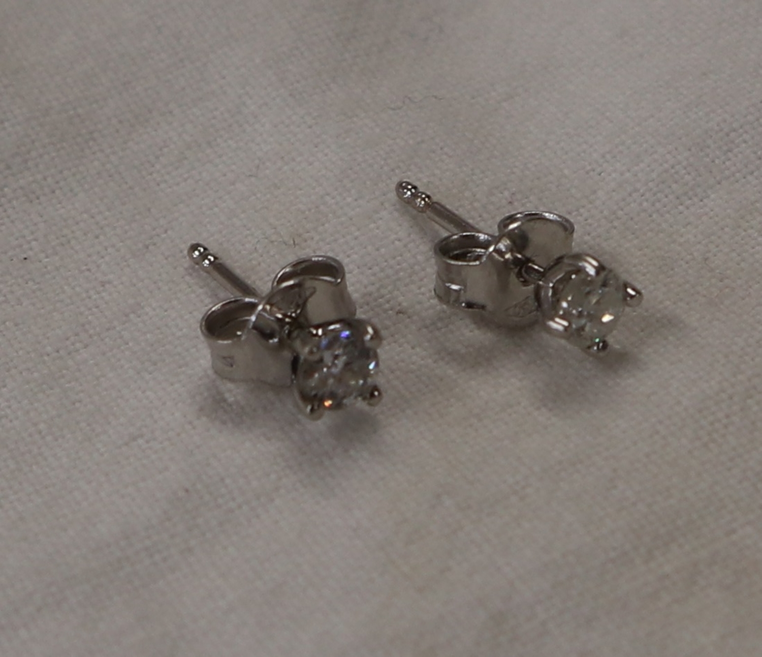 Pair of 18ct gold diamond stud earrings