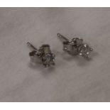 Pair of 18ct gold diamond stud earrings