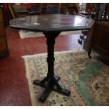 Heavily carved octagonal occasional table