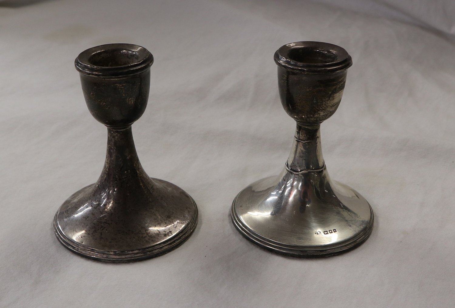 Pair of silver candlesticks