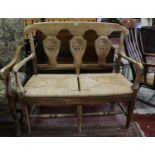 Carved shield back rush seated pine 2 seater