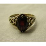 Gold garnet set ring