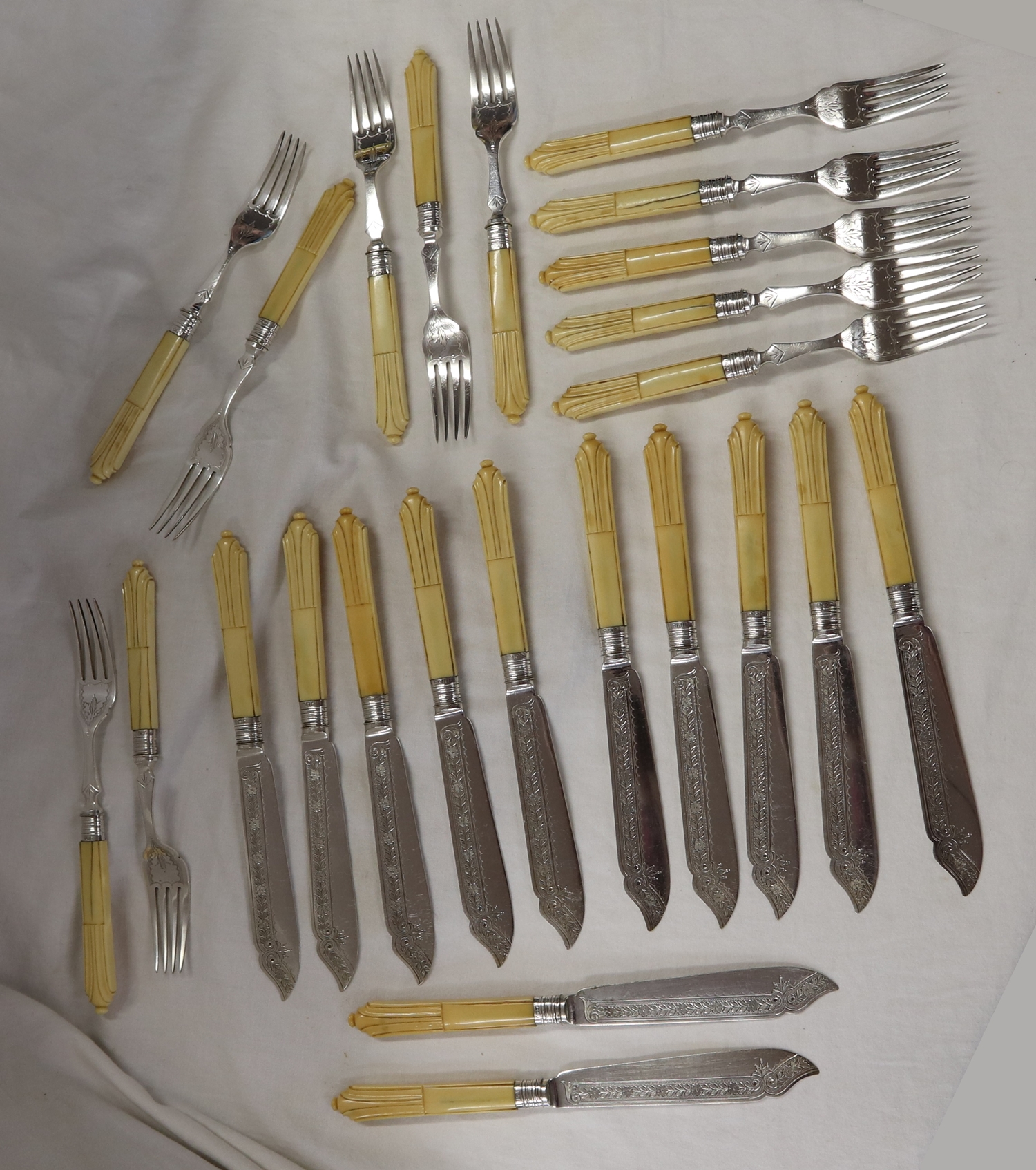 Collection of bone handled silver fish knives and forks to include 1 silver plate