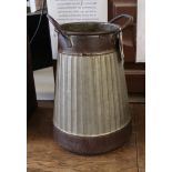 Corrugated tin urn