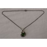 Silver peridot pendant on chain