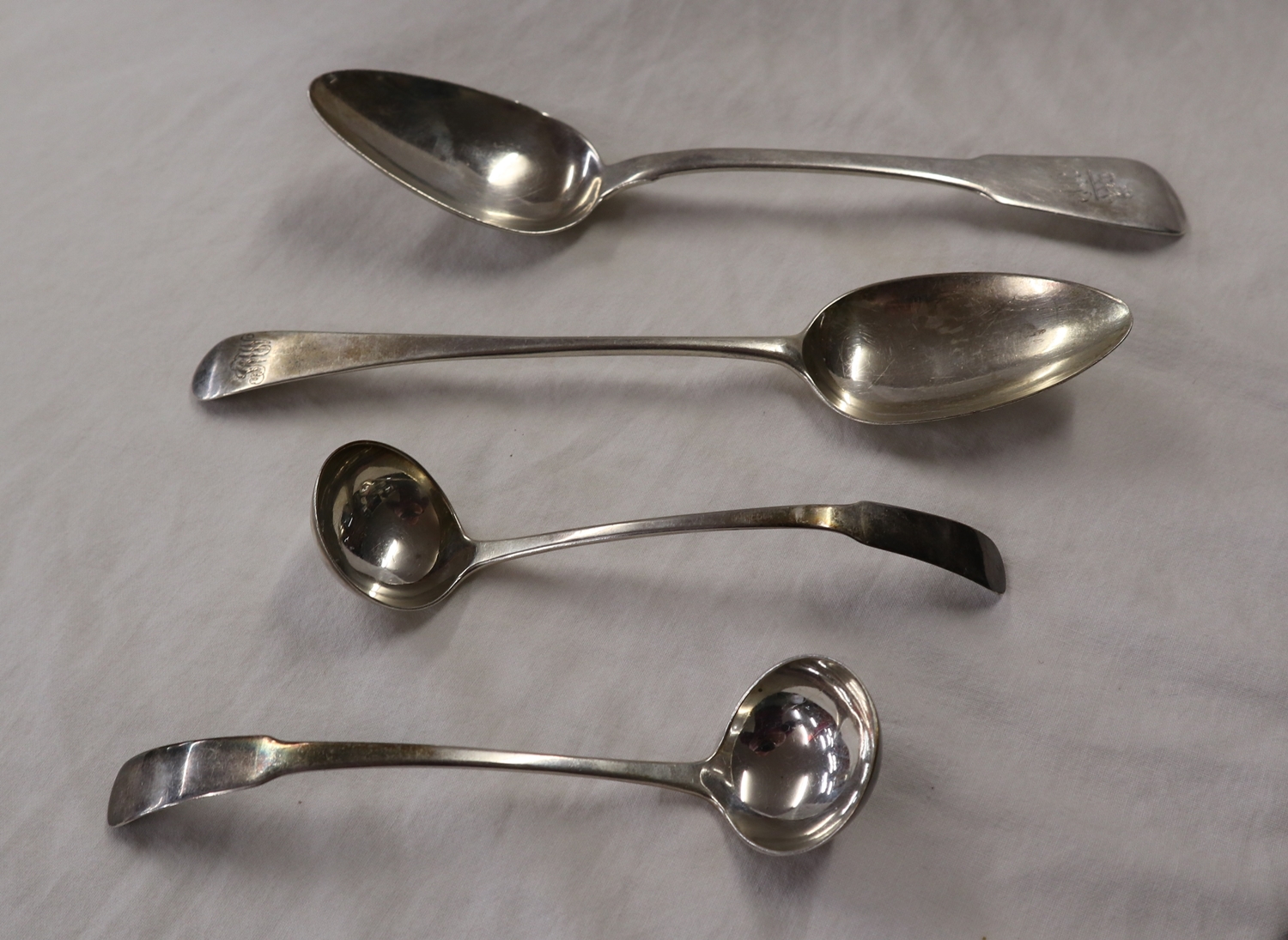 Pair of Scottish silver ladles, large Irish silver serving spoon & English silver serving spoon -