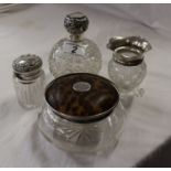 4 silver mounted / topped glass bottles