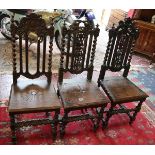 Pair of carved oak chairs & another