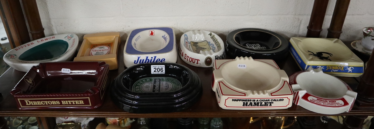 Shelf of pub advertising ashtrays