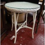 Lloyd loom circular table with protective glass top