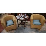 Pair of comfortable wicker tub chairs (believed to be by Heals)