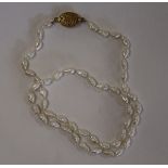 Seed pearl necklace with silver gilt clasp