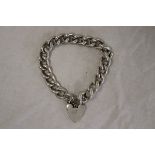 Silver bracelet with heart locket