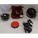 Collection of 4 fishing reels to include a vintage example