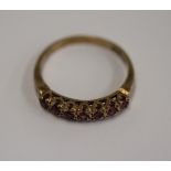 Gold 7 stone set ring