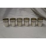 Set of six German white metal shot cups