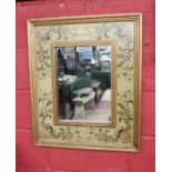 Decorative wall mirror with painted flower surround