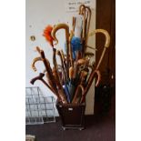 Large quantity of walking stick, umbrellas etc