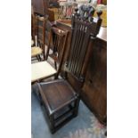 Tall carved oak hall chair