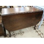 Early mahogany pad foot drop leaf table