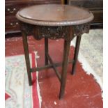 Carved oak circular table with revolving top