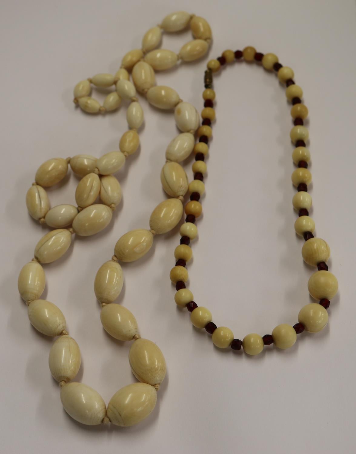 2 ivory bead necklaces