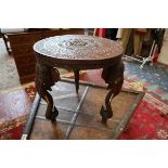 Finely carved hardwood elephant table with glass tusks