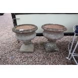 Pair of stone urn planters