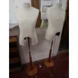 Pair of dress makers dummies on stand