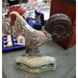 Metal cockerel door stop