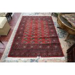Red patterned wool rug - Size: 140cm x 200cm