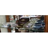 Shelf of vintage motoring ashtrays etc