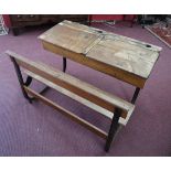 Cast frame and oak twin school desk with ink well's