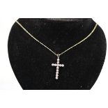 Gold diamond cross on gold chain