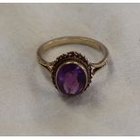 Gold stone set amethyst ring