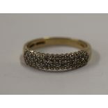 Gold 3 row diamond set ring