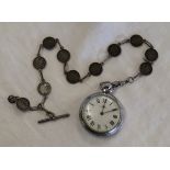 Pocket watch with unusual silver coin Albert chain