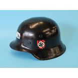 WWII helmet with Nazi insignia
