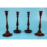 2 pairs of turned wooden candlesticks