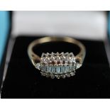 Gold baguette diamond set ring