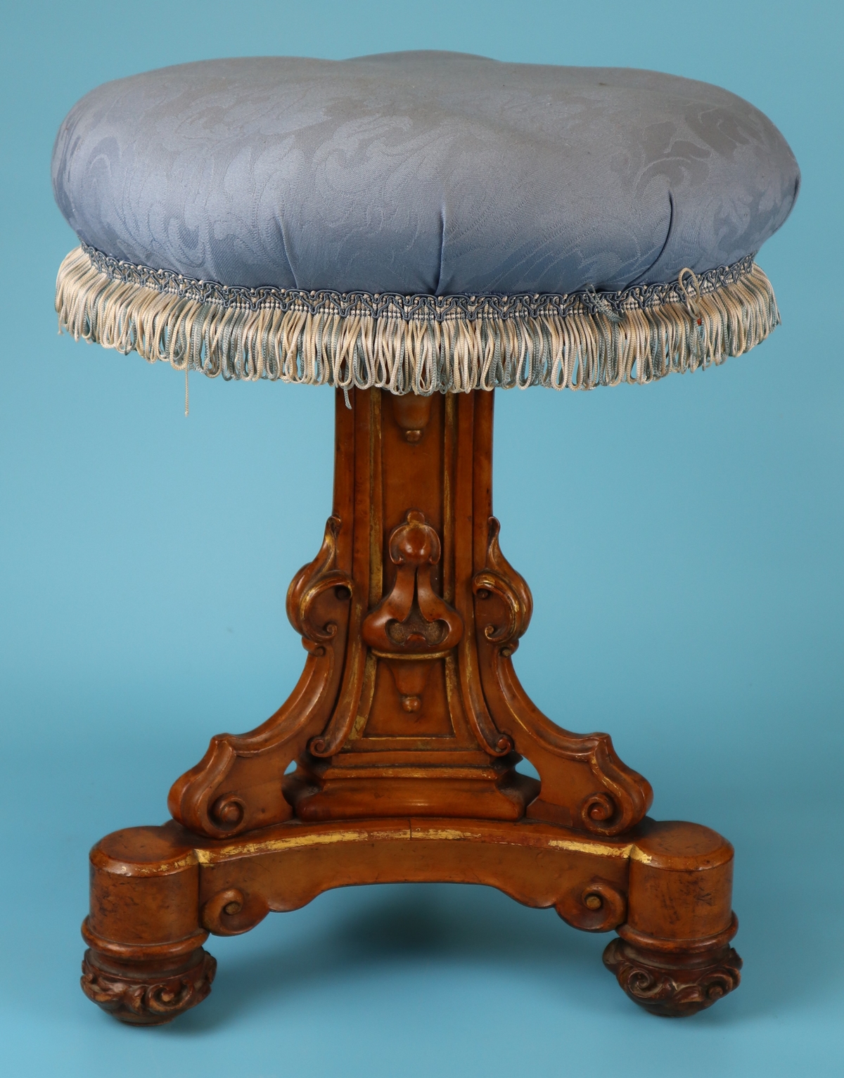 Fine Victorian Gothic walnut piano stool with some original gilding
