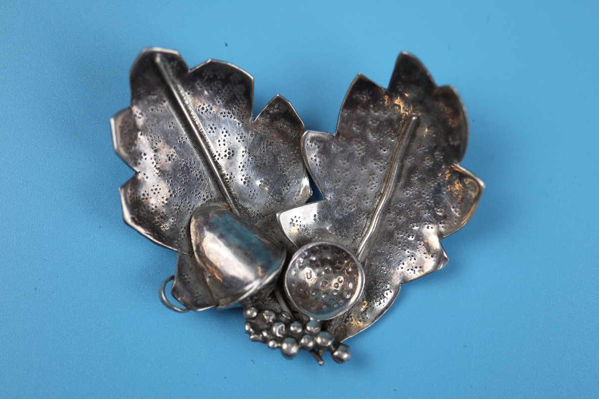 Heavy silver handcrafted acorn brooch