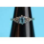 Gold, blue topaz & diamond set ring