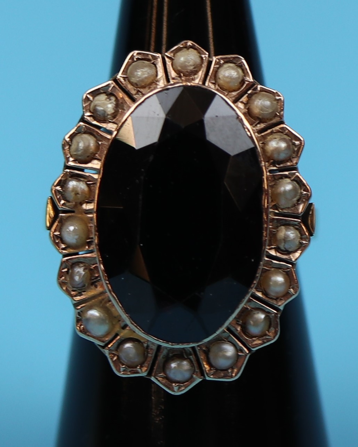 Gold garnet & seed pearl set ring