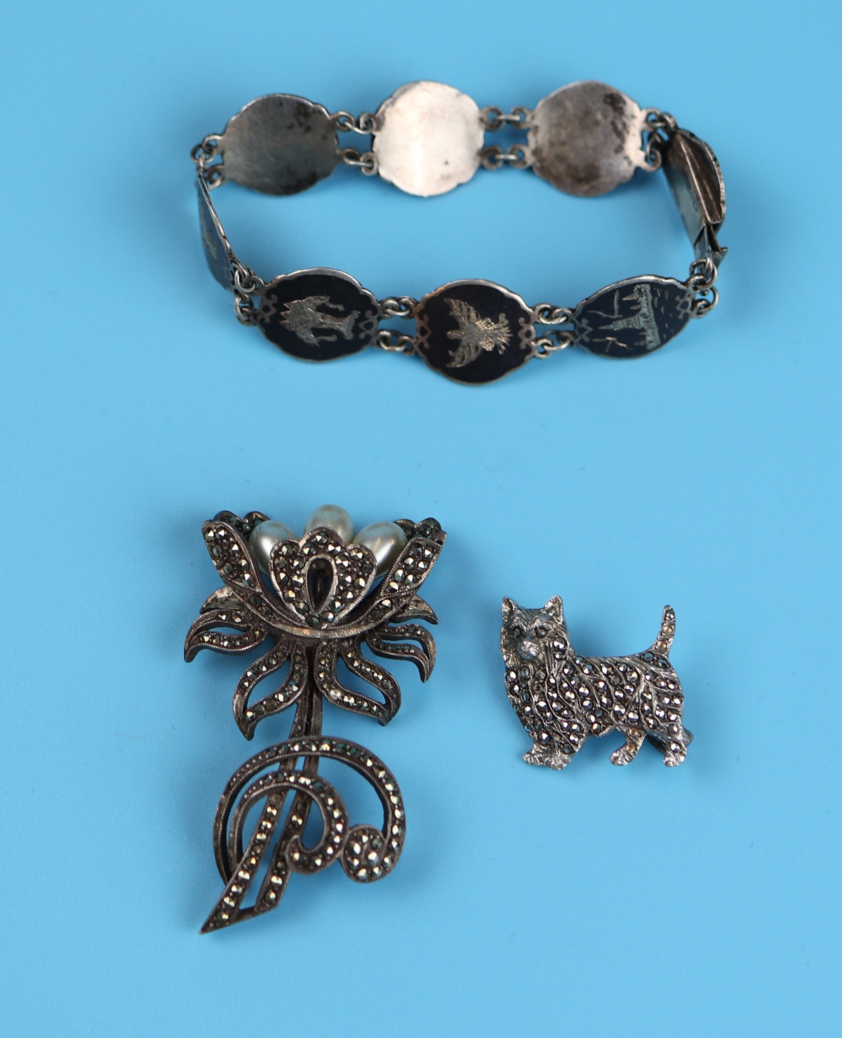 2 silver marcasite brooches & silver bracelet