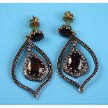 Pair of garnet & diamond earrings