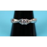 18ct white gold diamond solitaire ring with diamond shoulders