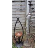 Copper water feature and garden candle